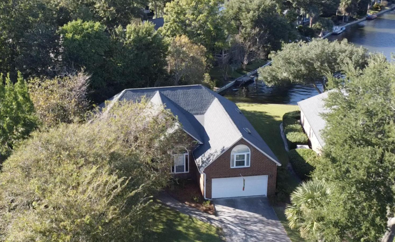 Aerial view of waterfront home at 1323 Deep Water Drive