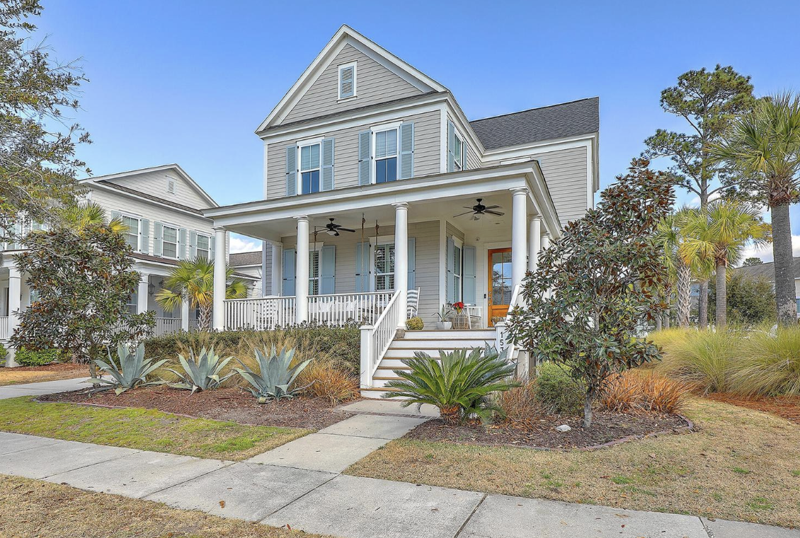 Lowcountry porch home at 1534 Banning Street with magnolias and palms
