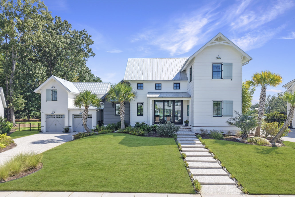 Coastal lowcountry home with metal roof and palmettos at 3819 Sawyers Island Drive